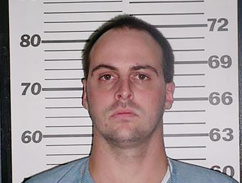 This 2003 photo provided by the Tennessee Department of Correction shows Curtis Ray Watson. The Tennessee convict suspected of killing a longtime corrections employee and escaping a prison on a tractor could have left the state, authorities said Thursday as the manhunt for the elusive inmate intensified.(Tennessee Department of Correction via AP)