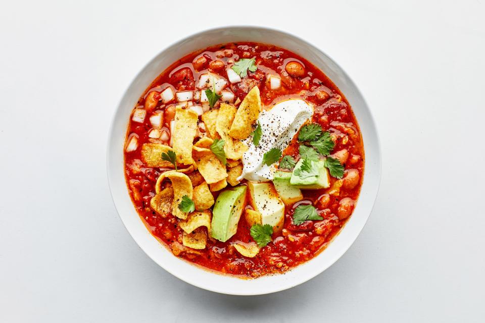 Quick, spicy, filling, and made mostly of pantry ingredients, this chili/tortilla soup/Frito pie mash-up is calling your name. (Shhh. Listen closely.) <a href="https://www.bonappetit.com/recipe/vegetarian-bean-chili-with-fritos?mbid=synd_yahoo_rss" rel="nofollow noopener" target="_blank" data-ylk="slk:See recipe." class="link ">See recipe.</a>