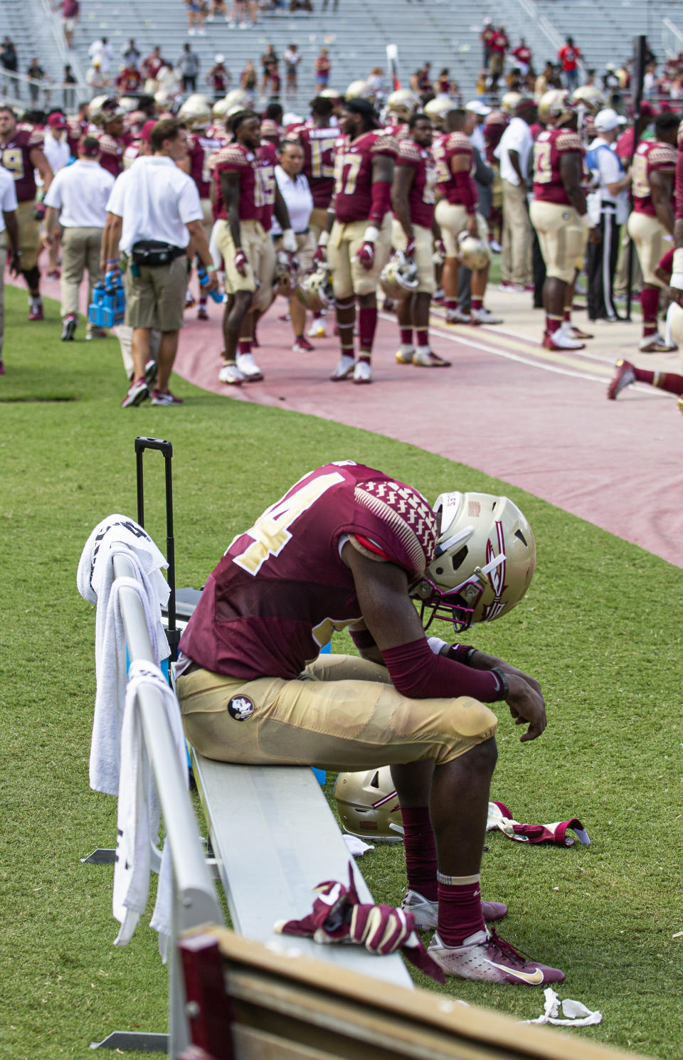 Florida State defensive back Brendan Gant (44) sits on the bench as time runs down in the second half of an NCAA college football game against Boise State in Tallahassee, Fla., Saturday, Aug. 31, 2019. Boise State defeated Florida State 36-31. (AP Photo/Mark Wallheiser)