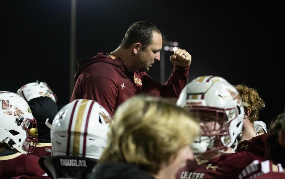 Chiefs head coach Wesley Summerford is hoisted by his players as they celebrate their 21-11 victory in the Union County vs Northview Class 1-1R State Semifinal playoff football game at Northview High School in Bratt, Florida on Friday, Dec. 2, 2022.