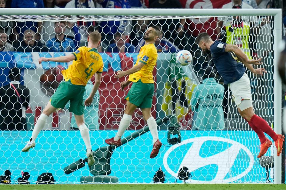 France's Olivier Giroud, right, scores his side's fourth goal during the World Cup group D football match between France and Australia, at the Al Janoub Stadium in Al Wakrah, Qatar, Tuesday, Nov. 22, 2022. (AP Photo/Francisco Seco)