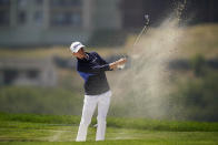 Justin Thomas hits from the bunker on the 16th hole during the third round of the PGA Championship golf tournament at TPC Harding Park Saturday, Aug. 8, 2020, in San Francisco. (AP Photo/Charlie Riedel)