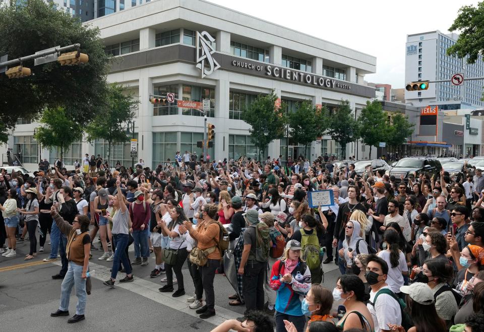 Pro-Palestinian protesters block Guadalupe Street at the University of Texas Wednesday April 24, 2024.