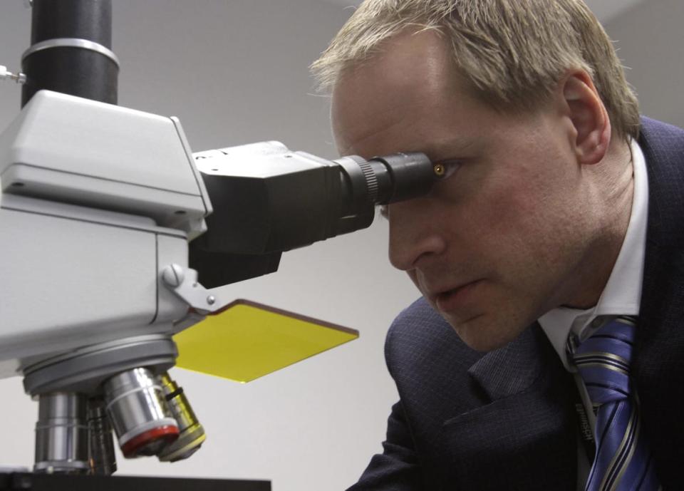 <div class="inline-image__caption"><p>Jason Mott, a manager of the Central Public Health Reference Laboratory (CPHRL), looks trough a microscope during a media tour of the laboratory in Tbilisi, March 16, 2011.</p></div> <div class="inline-image__credit">David Mdzinarishvili/Reuters</div>