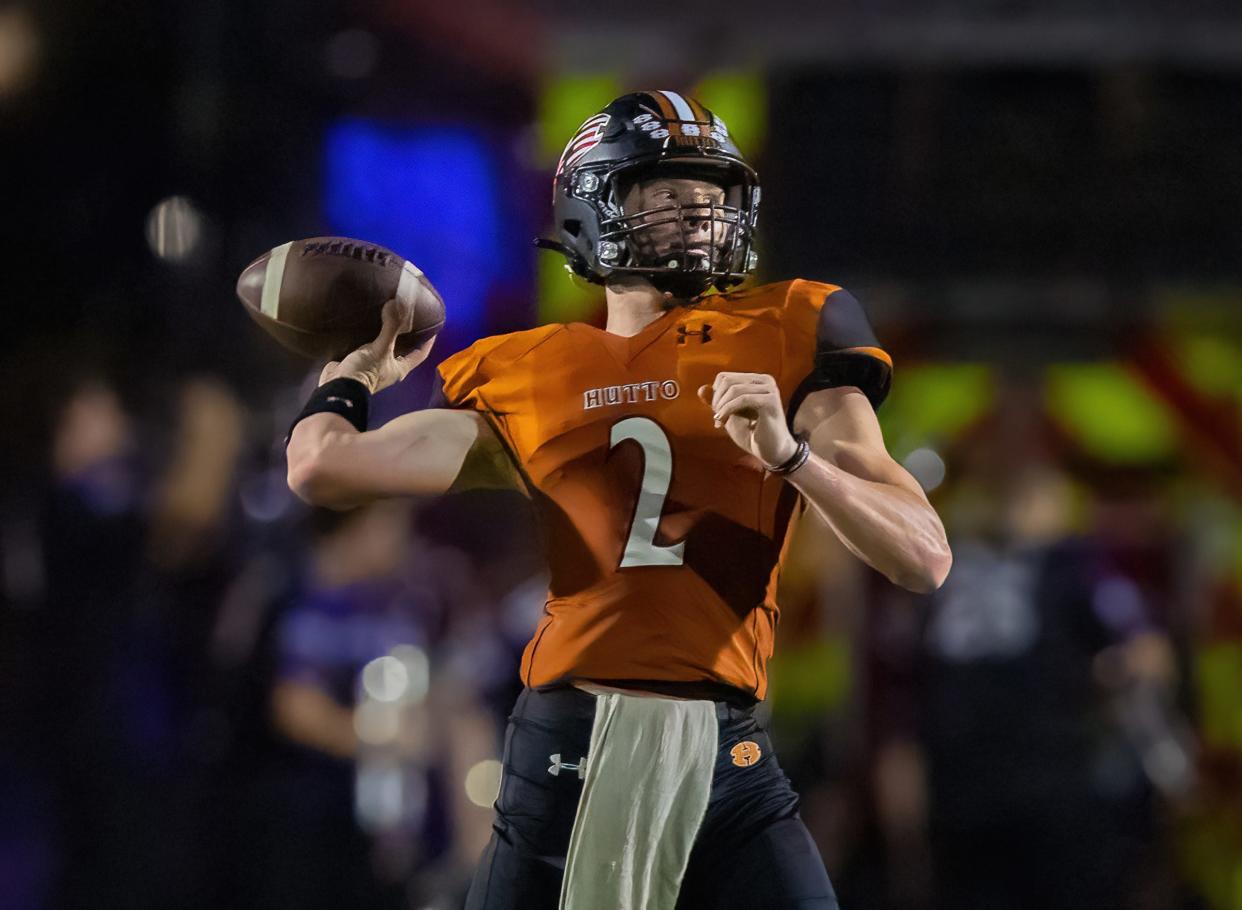 Hutto Hippos quarterback William Hammond (2) throws a long forward pass for a first down against the Liberty Hill Panthers during the second quarter at the nondistrict football game on Friday, Sept 2, 2022, at Hutto High School in Hutto, TX.