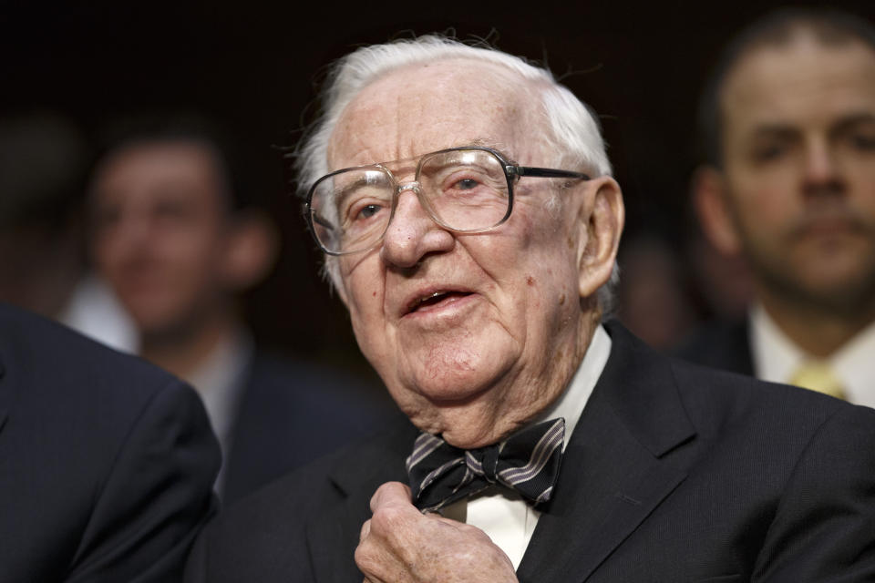 FILE - In this April 30, 2014 file photo, retired Supreme Court Justice John Paul Stevens prepares to testify on the ever-increasing amount of money spent on elections as he appears before the Senate Rules Committee on Capitol Hill in Washington. Stevens, the bow-tied, independent-thinking, Republican-nominated justice who unexpectedly emerged as the Supreme Court's leading liberal, died Tuesday, July 16, 2019, in Fort Lauderdale, Fla., after suffering a stroke Monday. He was 99. (AP Photo, File)