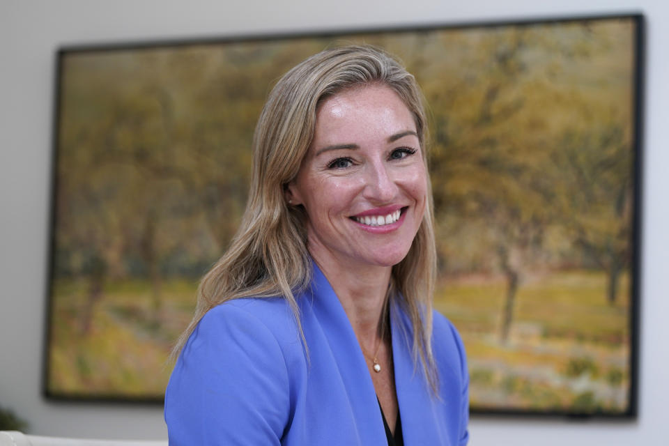 Nurse Practitioner and former Democratic candidate for the Virginia House of Delegates, Susanna Gibson, smiles during an interview at her home Wednesday Nov. 15, 2023, in Henrico, Va. (AP Photo/Steve Helber)