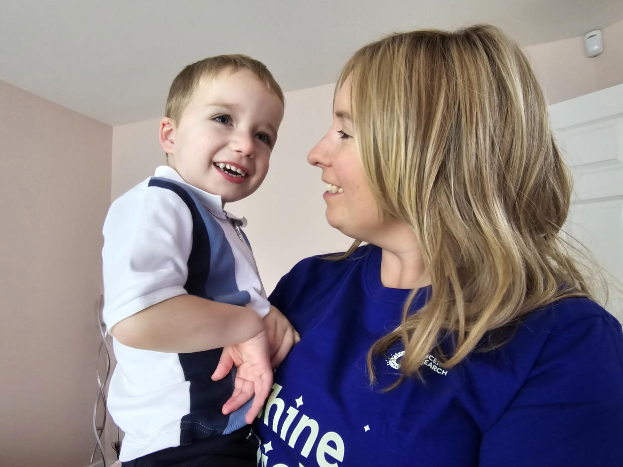 Ashley McLean says a hug from her son may have saved her life after it helped diagnose her breast cancer, pictured with Noah. (Cancer Research UK/SWNS)