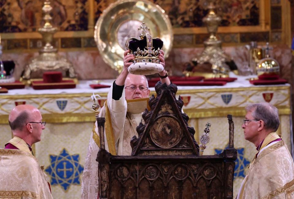 The Archbishop of Canterbury crowns the King