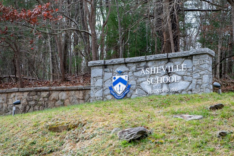 A stone sign marks the entrance to Asheville School on the west side of Asheville on Dec. 1, 2020. 