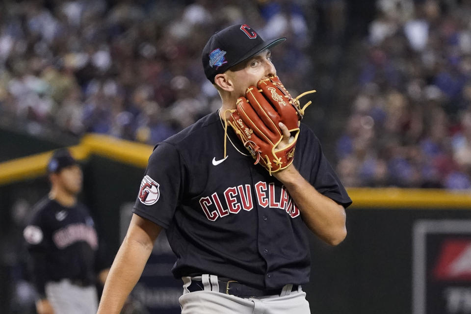 Cleveland Guardians pitcher Tanner Bibee reacts to a pitch against the Arizona Diamondbacks during the sixth inning of a baseball game, Sunday, June 18, 2023, in Phoenix. (AP Photo/Darryl Webb)