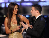 LAS VEGAS, NV - JANUARY 14: Television personality and pageant co-host Brooke Burke Charvet (L) talks with pageant judge and dancer Mark Ballas during the 2012 Miss America Pageant at the Planet Hollywood Resort & Casino January 14, 2012 in Las Vegas, Nevada. (Photo by Ethan Miller/Getty Images)