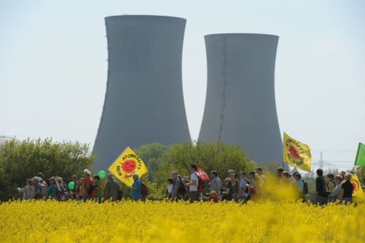 Anti-nuclear protesters march past the Grafenrheinfeld nuclear power plant near the southern German city of Bergrheinfeld. German industrial giant Siemens is turning the page on nuclear energy in line with Berlin's decision to agree to an end to atomic power, the group's CEO Peter Loescher said