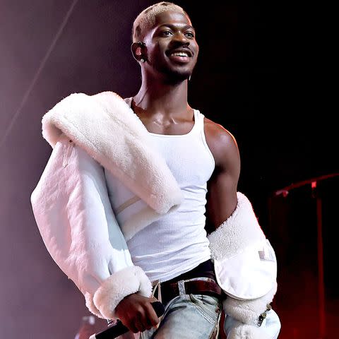 <p>Theo Wargo/Getty</p> Lil Nas X performs at Coachella in April 2024