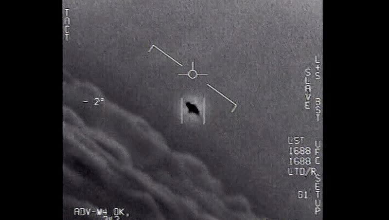 In an image from video provided by the Department of Defense labeled Gimbal, from 2015, an unexplained object is seen at center as it is tracked high along the clouds, traveling against the wind. “There’s a whole fleet of them,” one naval aviator tells another, though only one indistinct object is shown. “It’s rotating.”