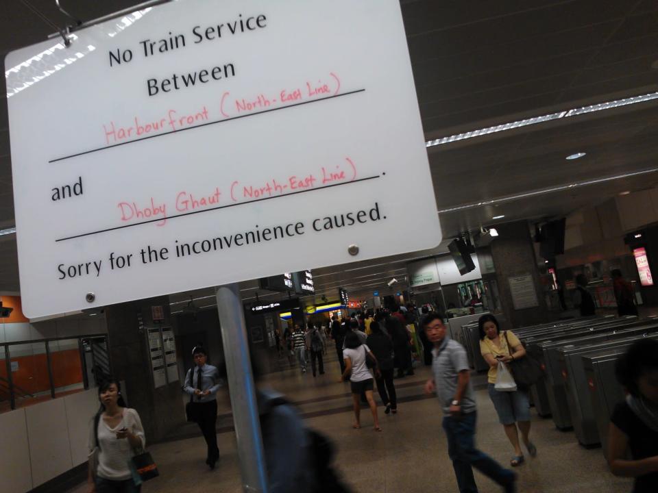 Signs were put up during peak hour at all train stations to inform commuters of the disruption, including this one at Tanjong Pagar station. (Yahoo! photo)