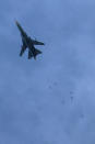 <p>A Syrian air force MiG-23 jet drops a payload during a reported regime air strike in the rebel-held town of Arbin, in the besieged Eastern Ghouta region on the outskirts of the capital Damascus, Syria, Feb. 7, 2018. (Photo: Amer AlMohibany/AFP/Getty Images) </p>