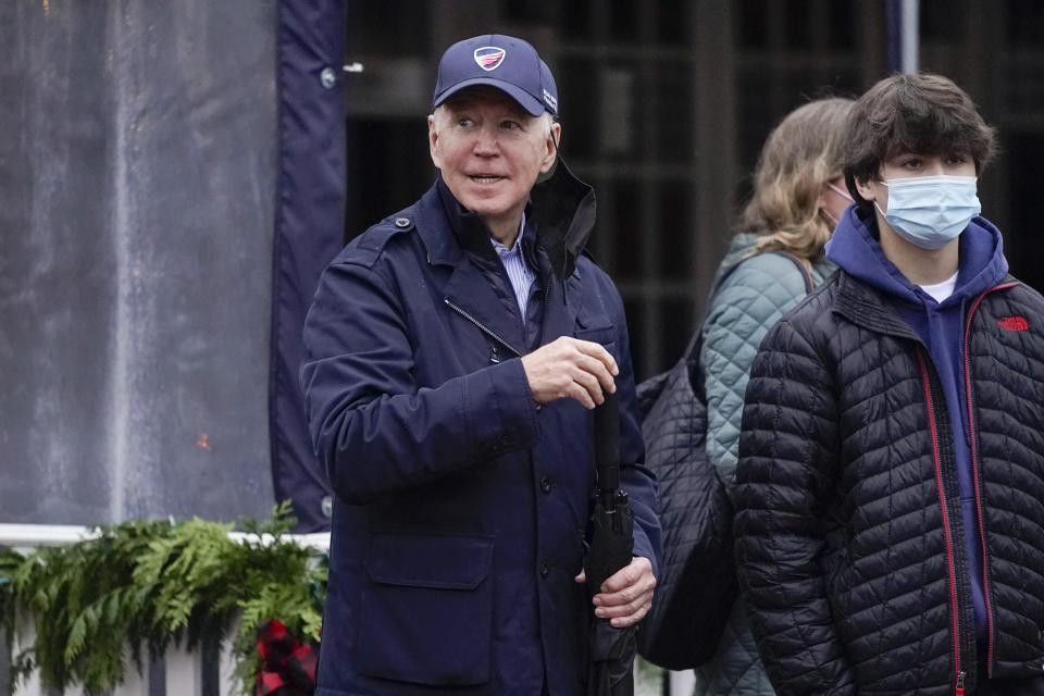 President Joe Biden walks by shops with his grandson Hunter Biden in Nantucket, Mass., Friday, Nov. 26, 2021. (AP Photo/Carolyn Kaster)