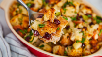 <p>You don't need meat to make a <a href="https://www.delish.com/uk/cooking/recipes/g29709229/christmas-stuffing-recipe/" rel="nofollow noopener" target="_blank" data-ylk="slk:stuffing;elm:context_link;itc:0;sec:content-canvas" class="link ">stuffing</a> everyone will love. This <a href="https://www.delish.com/uk/cooking/recipes/g29890255/vegetarian-recipes/" rel="nofollow noopener" target="_blank" data-ylk="slk:vegetarian;elm:context_link;itc:0;sec:content-canvas" class="link ">vegetarian</a> option is filled with everyone's favourite flavours—apples! cranberries! sage! thyme!—if anyone complains about meatless stuffing, just send them home without dessert. Aside from the cranberries, this is a purely traditional sourdough stuffing. </p><p>Get the <a href="https://www.delish.com/uk/cooking/recipes/a31892767/easy-cranberry-stuffing-recipe/" rel="nofollow noopener" target="_blank" data-ylk="slk:Cranberry Stuffing;elm:context_link;itc:0;sec:content-canvas" class="link ">Cranberry Stuffing</a> recipe.</p>