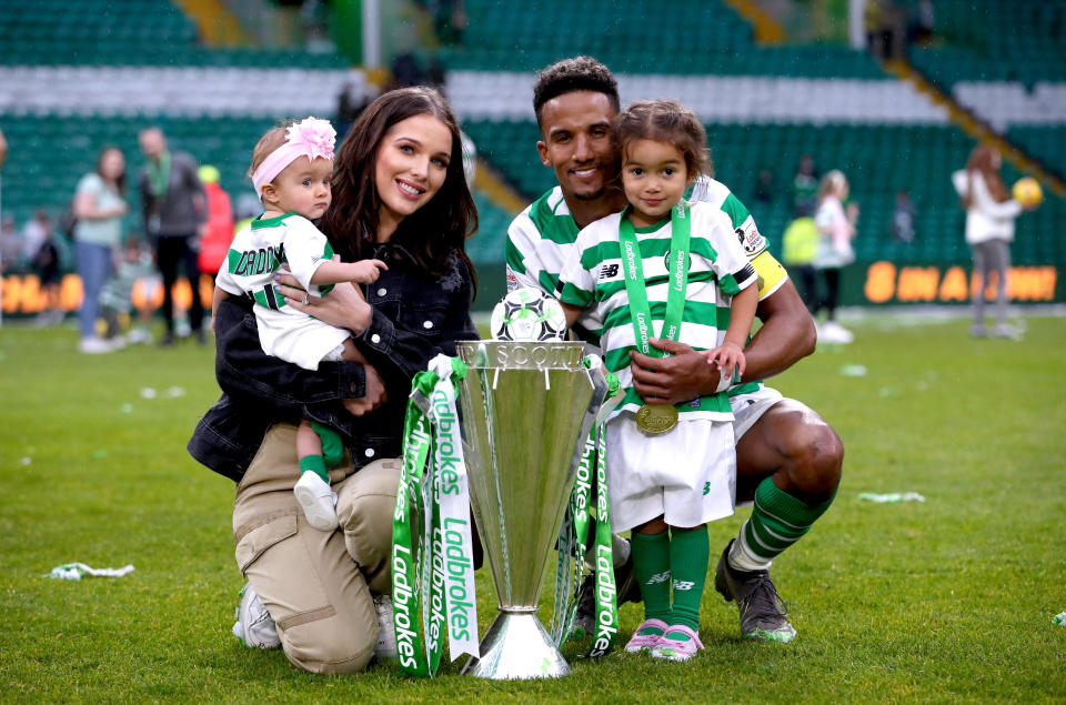 Celtic's Scott Sinclair, Helen Flanagan and their children with the trophy after winning the Ladbrokes Scottish Premiership match at Celtic Park, Glasgow.