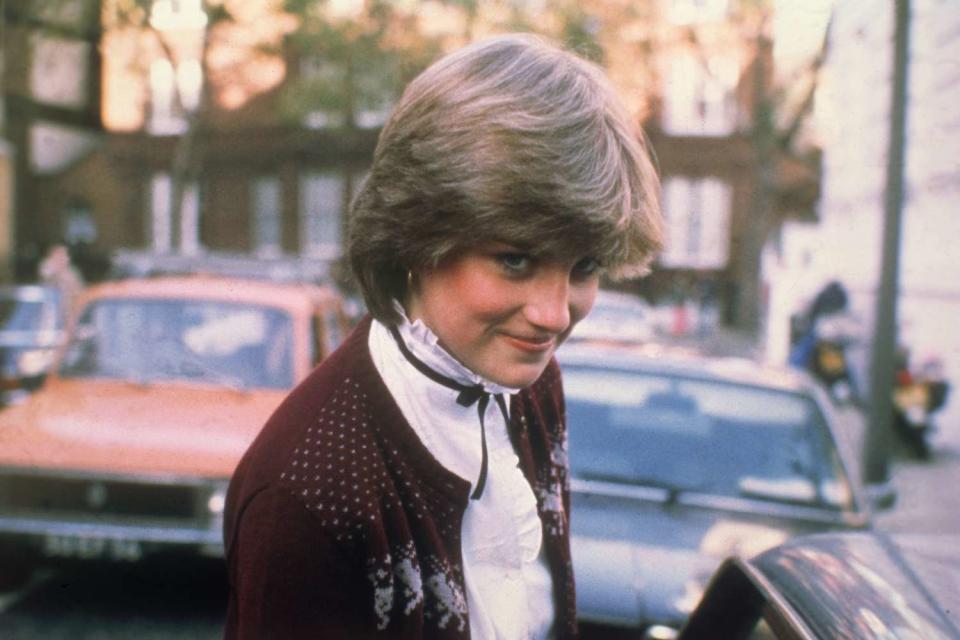 <p>Central Press/Hulton Archive/Getty</p> The future Princess Diana leaves her London home on Nov. 12, 1980