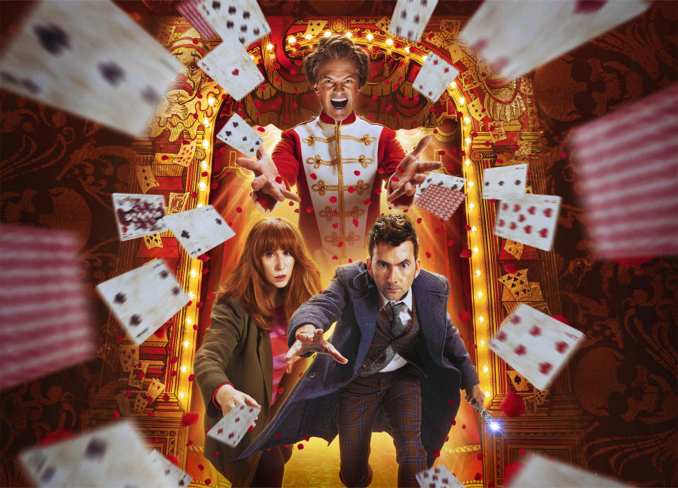 The poster for the third Doctor Who 60th anniversary special, The Giggle, featuring the Doctor and Donna crouched in front of The Toymaker (Neil Patrick Harris) who is throwing playing cards towards the screen