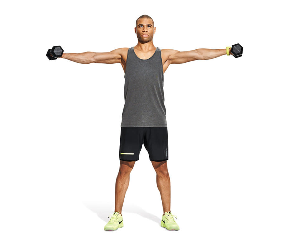 <p>James Michelfelder</p>How to Do It<ol><li>Stand with feet shoulder-width apart (or slightly narrower), and hold dumbbells at your sides, palms facing one another, to start. </li><li>Raise the weights out 90 degrees to your sides. </li><li>Lower your arms back to your sides while exhaling. That's 1 rep. </li><li><strong>Pro Tip:</strong> Don’t bend your elbows or swing your arms; the motion should be controlled and steady. If you need to start with lighter weights, do so. </li></ol>