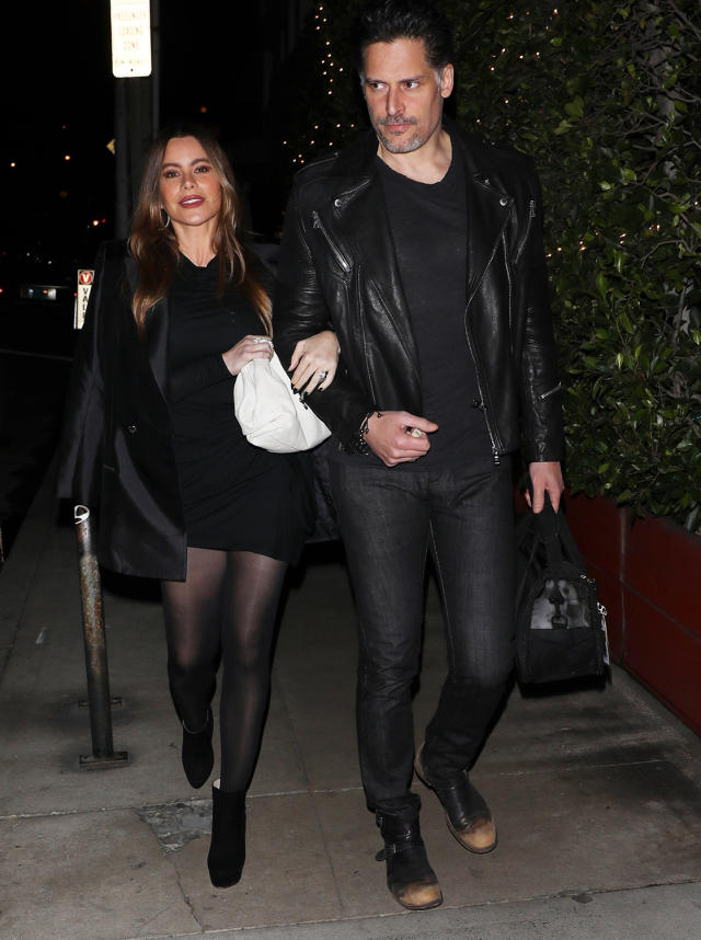 Sofia Vergara rocks an oversized black sweater with matching tights and  boots as she arrives at