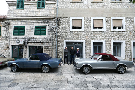 People look at oldtimer Mercedes cars in Imotski, Croatia, May 19, 2019. REUTERS/Antonio Bronic