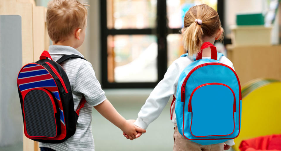 Stock image of school kids holding hands after teachers ban Year 5 students from dating at Riverside Elementary School in Jeffersonville, Indiana. 
