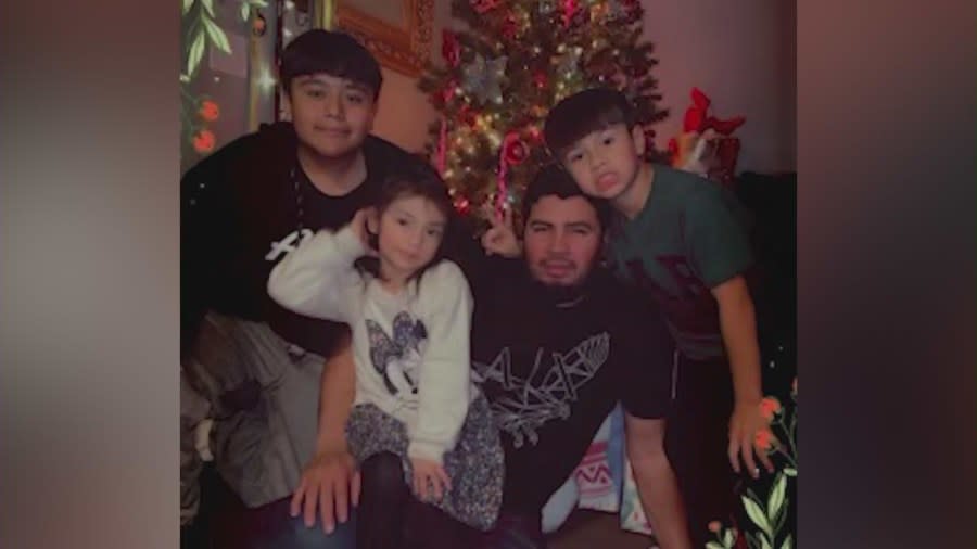 Derrick Serrano and his family are seen in a personal photo.