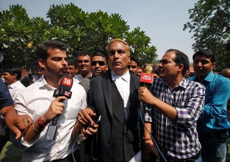 A.P. Singh (C), a lawyer representing three of the four men convicted of raping and murdering a 23-year-old trainee physiotherapist in 2012, talks to media after the court hearing in New Delhi, May 5, 2017. REUTERS/Adnan Abidi