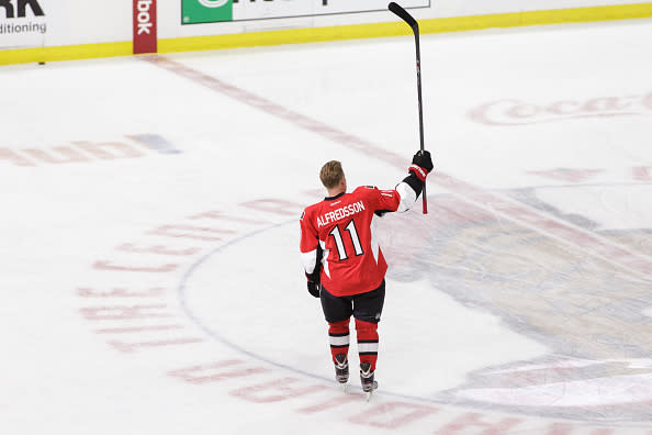 OTTAWA, ON - DECEMBER 4: Daniel Alfredsson #11 of the Ottawa Senators acknowledges the fans during warmups on the day he signed a one day contract and then announced his retirement prior to an NHL game against the New York Islanders at Canadian Tire Centre on December 4, 2014 in Ottawa, Ontario, Canada. (Photo by Jana Chytilova/Freestyle Photography/Getty Images)