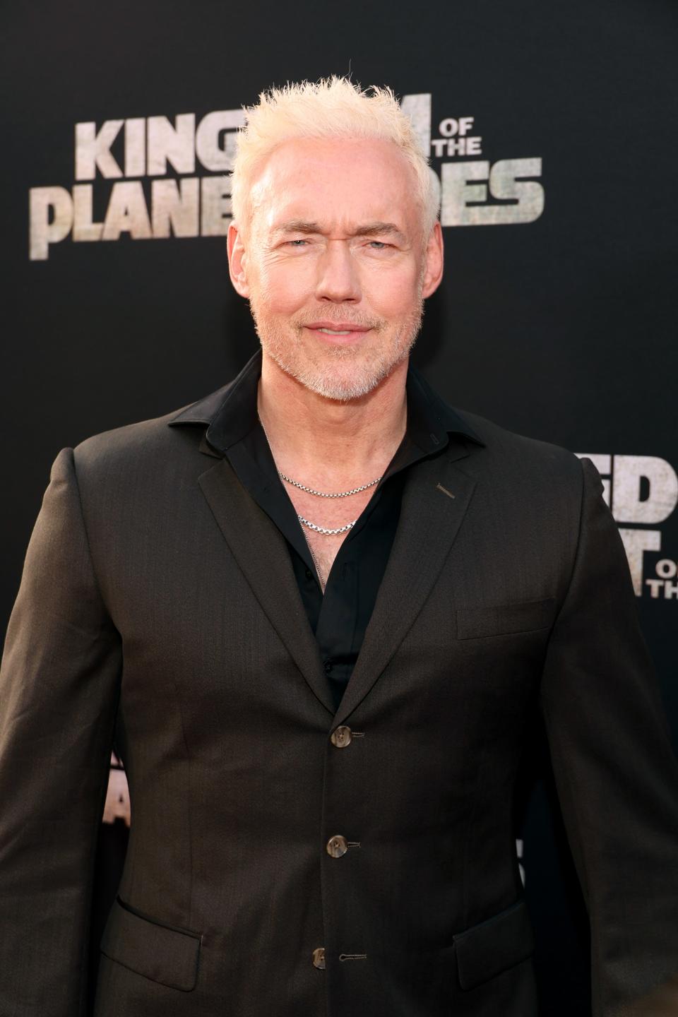 Kevin Durand in a black suit without a tie at Kingdom of the Planet of the Apes premiere