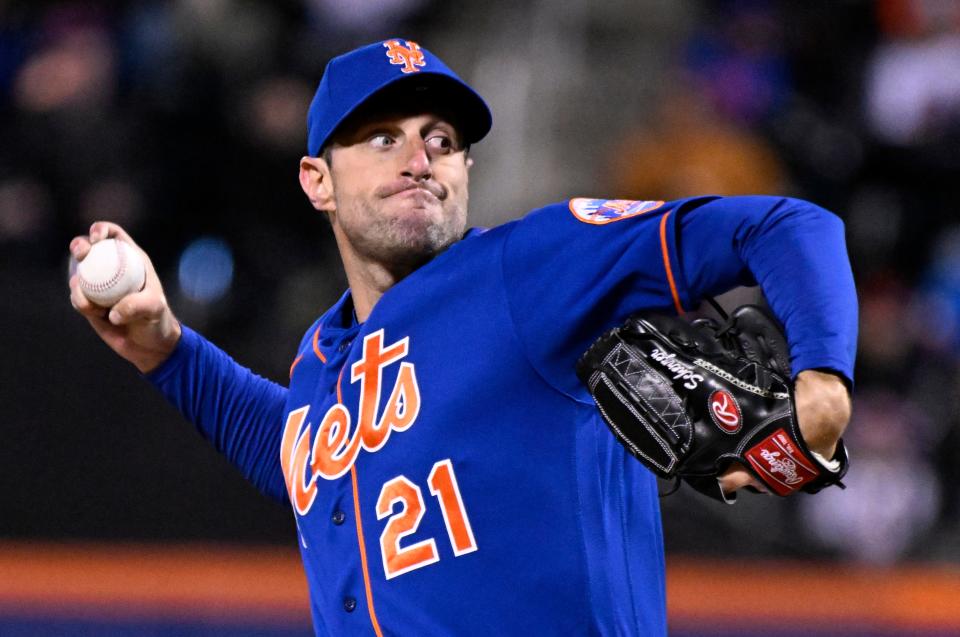 New York Mets starting pitcher Max Scherzer (21) delivers the ball to the San Francisco Giants during the second inning of the second game of a baseball double-header Tuesday, April 19, 2022, in New York.