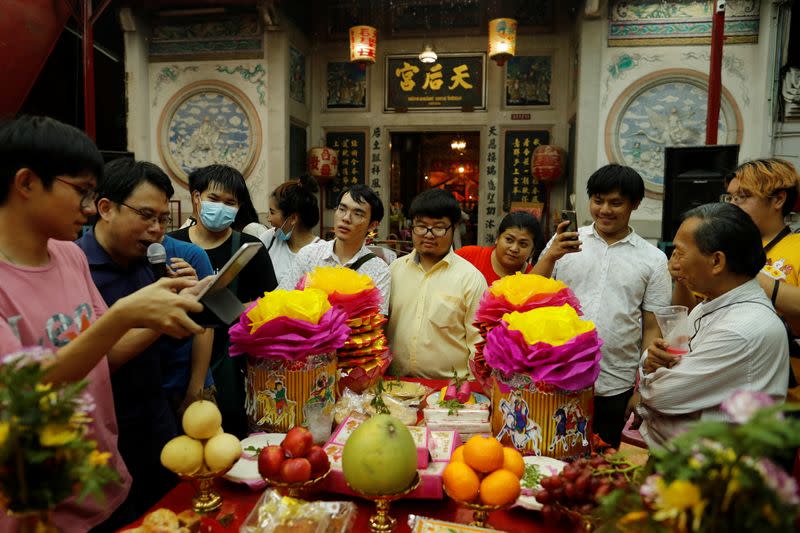 The Wider Image: In old Bangkok, a goddess resists a wave of gentrification