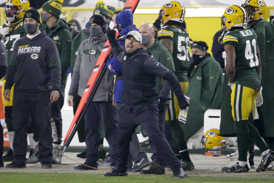 Green Bay Packers head coach Matt LaFleur reacts after a pass interference call was made against Green Bay during the second half of the NFC championship NFL football game against the Tampa Bay Buccaneers in Green Bay, Wis., Sunday, Jan. 24, 2021. (AP Photo/Mike Roemer)