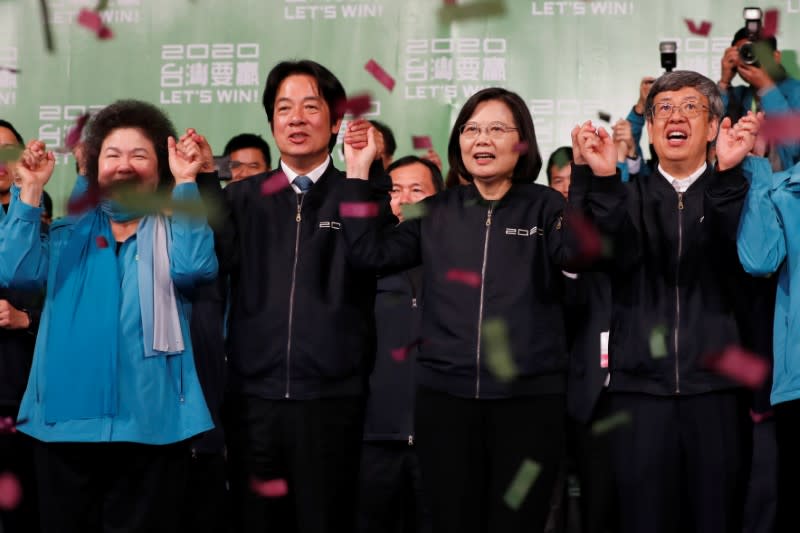 Presidential Office Secretary-General Chen Chu, Vice President-elect William Lai, incumbent Taiwan President Tsai Ing-wen and incumbent Vice President Chen Chien-jen celebrate at a rally after their election victory in Taipei