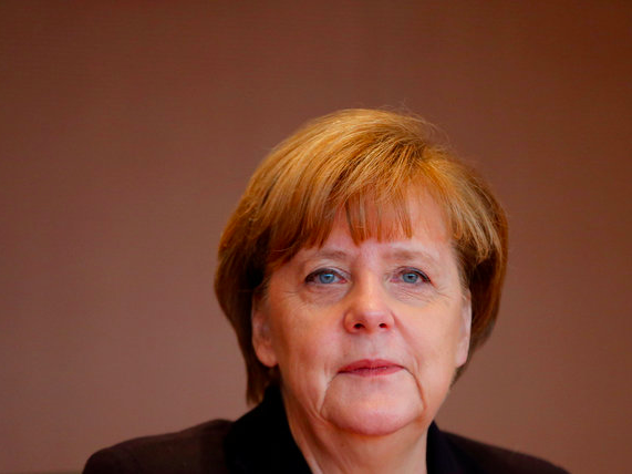 German Chancellor Angela Merkel attends the weekly cabinet meeting at the Chancellery in Berlin, Germany December 1, 2015. REUTERS/Fabrizio Bensch/File Photo