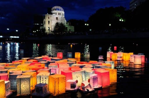 Paper lanterns to mourn victims of the World War II atomic bombs float in the Motoyasu River in front of the Atomic Bomb Dome (in background) in Hiroshima in 2011. A grandson of former US president Harry Truman, who authorised the atomic bombing of Japan during World War II, met survivors in Tokyo Friday, calling it "a good first step towards healing old wounds"