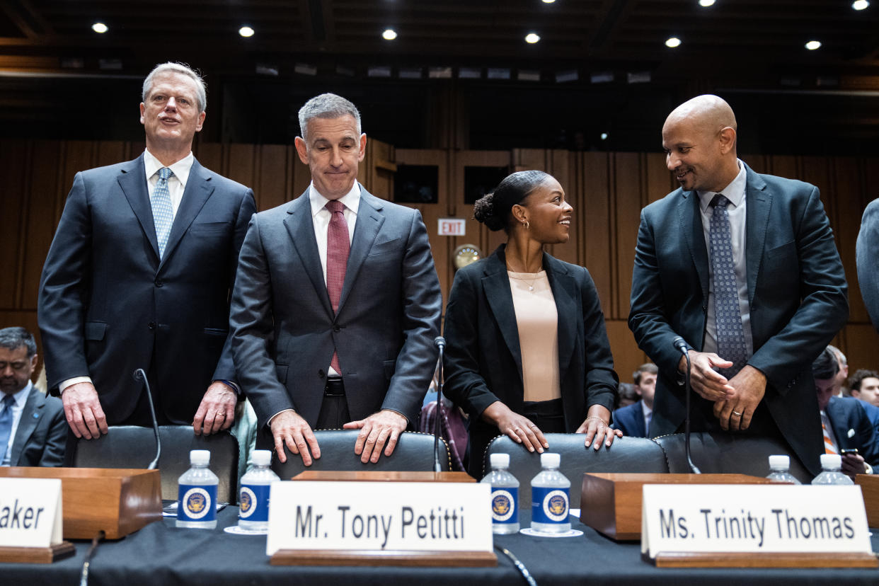 From left, NCAA president Charlie Baker, Big Ten commissioner Tony Petitti, Florida gymnast Trinity Thomas and National College Players Association executive director Ramogi Huma prepare for the Senate Judiciary Committee hearing on Tuesday. (Tom Williams/CQ-Roll Call, Inc via Getty Images)