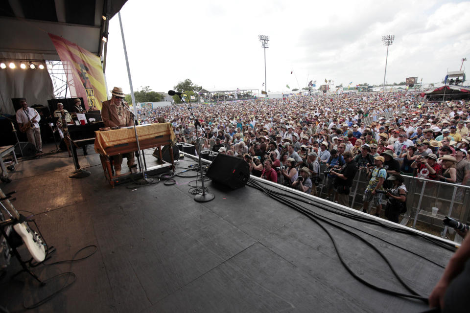 FILE - In this May 1, 2011 file photo, Dr. John (Mac Rebennack) performs at the Louisiana Jazz and Heritage Festival in New Orleans. April marks the start of spring festival season in south Louisiana. As the revelry of Mardi Gras and chill of winter end, spring festivals usher in the flip-flops, floppy hats and folding chairs toted by music lovers from across the globe. French Quarter Festival and Jazz Fest in New Orleans, and Festival International de Louisiana in Lafayette, La., are all held in April. Other Louisiana festivals held in spring and summer include Bayou Country Superfest in May, New Orleans Cajun-Zydeco Festival in June, Essence Music Festival in July and Satchmo Summerfest in August. (AP Photo/Gerald Herbert, File)