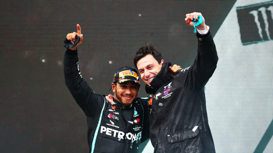 Lewis Hamilton shares the podium with Mercedes-AMG Petronas Formula 1 team principal and CEO Toto Wolff after winning his seventh World Drivers' Championship after the 2020 Turkish Grand Prix.