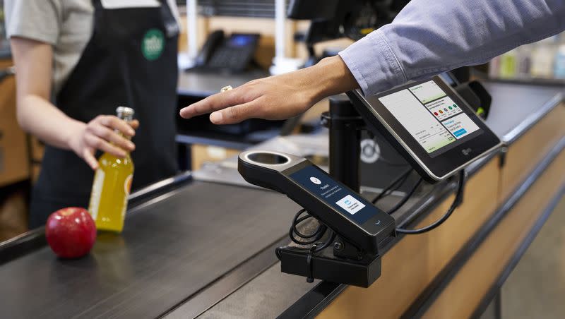 A palm scanner will soon be able to be utilized to provide payment at Whole Foods Market, which is owned by Amazon.