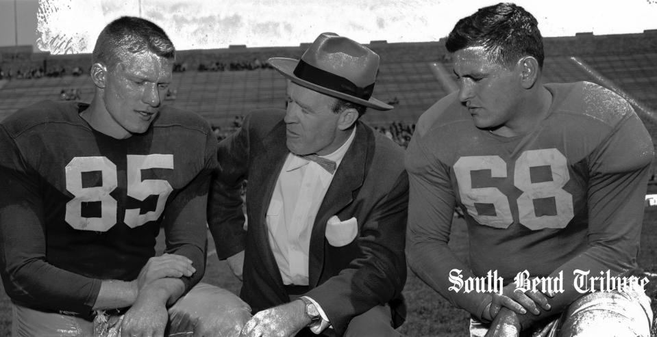 Notre Dame football coach Frank Leahy, center, meets in Notre Dame Stadium in May 1952 with Jim Mutscheller, left, the 1951 varsity team captain, and Jack Alessandrini, a current player, before the annual Old Timers Game. Leahy came to Rehoboth Beach in 1931 as an  assistant coach when Georgetown University held its training camp in the Delaware resort town.