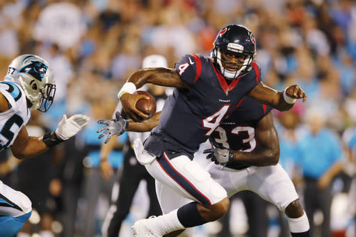 Deshaun Watson went 15-of-25 for 179 yards, was sacked three times and ran for a score. (AP)