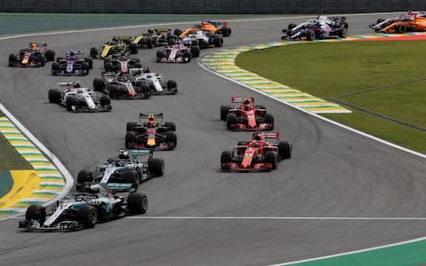 Autodromo Jose Carlos Pace, Interlagos, Sao Paulo, Brazil - November 11, 2018 Mercedes' Lewis Hamilton leads at the start of the race - Credit: REUTERS