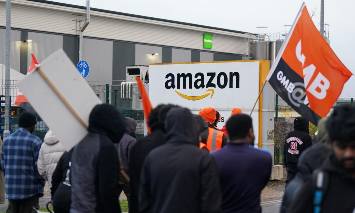 <span>Amazon members of the GMB union picketing the retailer's site in Coventry in November.</span><span>Photograph: Jacob King/PA</span>