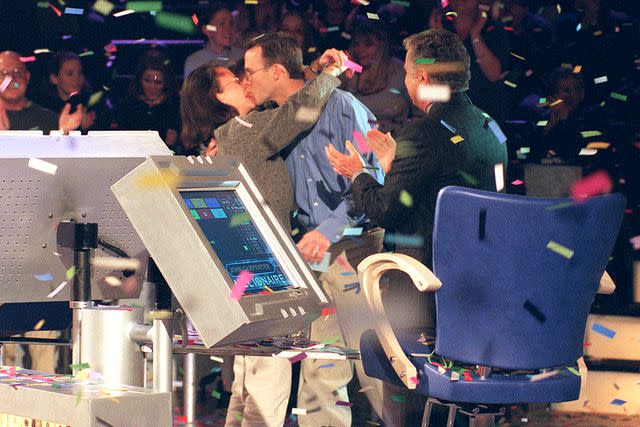 <p>Maria Melin/Disney General Entertainment Content via Getty</p> John and Debbie Carpenter celebrate the big win in 1999