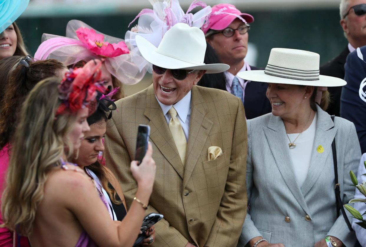 Trainer D. Wayne Lukas celebrates in the winner's circle after jockey Luis Saez rode Secret Oath to win the 148th running of the Kentucky Oaks at Churchill Downs in Louisville on May 6, 2022.
